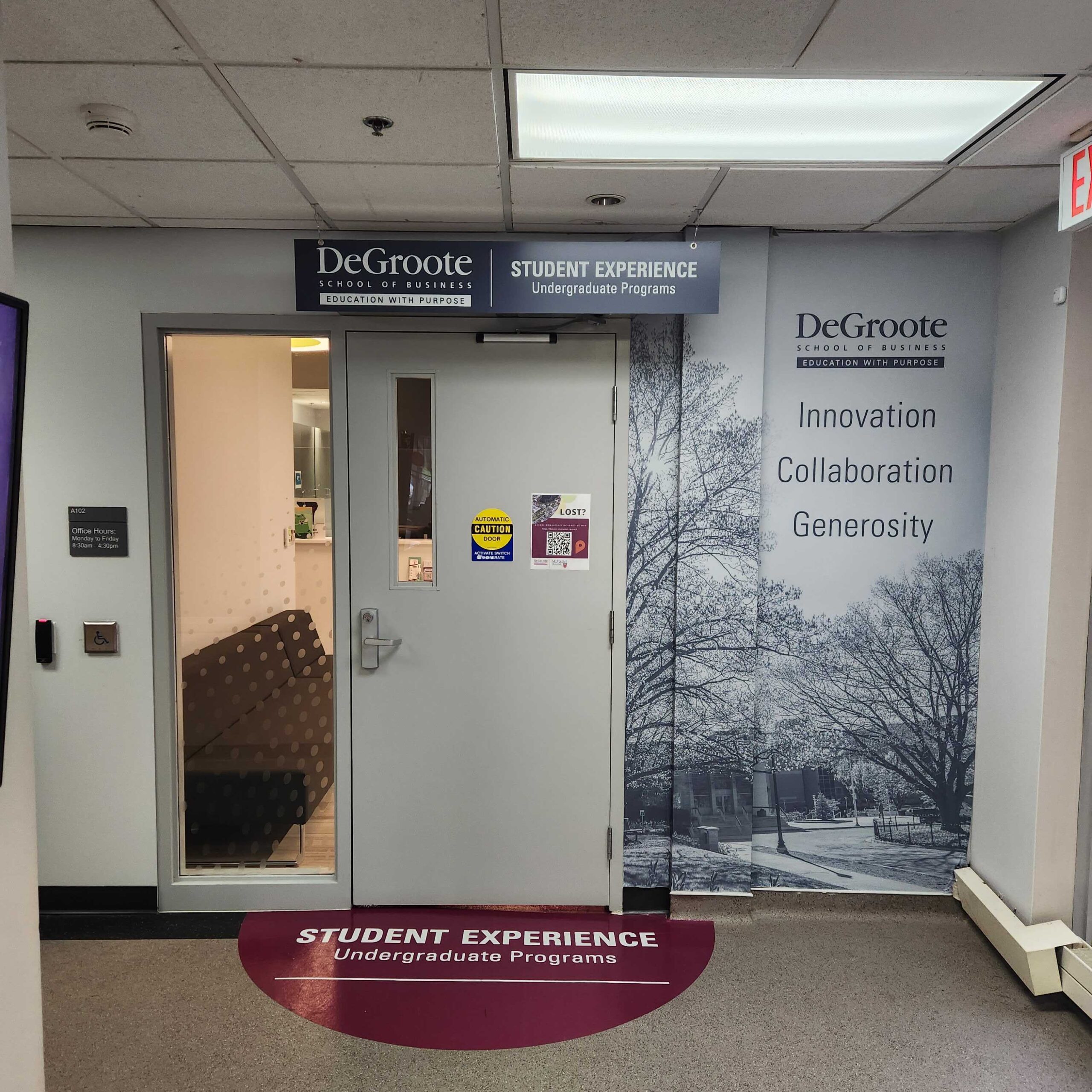 Undergraduate-Student-Experience-Office. This is what the front door entrance of the SE office looks like. Located at DeGroote School of Business building on the main McMaster University Campus.